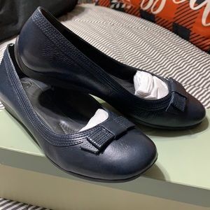 Navy blue leather flats, brand new with box.